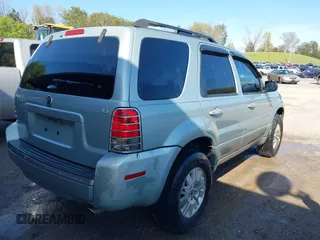2006 Mercury Mariner Luxury with VIN 4M2YU56106DJ09607, listed as a IAAI auction lot 41931293 with 249,346 mi miles and . Bid and sale history available at DreamBid. Image 4.