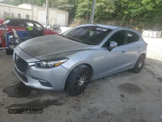 2018 Mazda 3 Touring z VIN 3MZBN1L39JM203695, wystawiony jako Copart lot #60787705 z przebiegiem Nie podano mil oraz Czysty tytuł • Clean title. Historia ofert i sprzedaży dostępna na DreamBid. Obrazek 1.