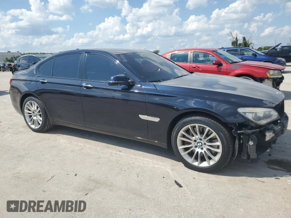 2014 BMW 7 Series 750i xDrive with VIN WBAYB6C53ED225212, listed as a Copart auction lot 71866424 with 122,567 mi miles and Salvage Title. Bid and sale history available at carsss.com. Image 4.