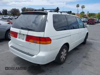2003 Honda Odyssey EX-L with VIN 5FNRL18973B113215, listed as a IAAI auction lot 42052917 with Not Provided miles and . Bid and sale history available at DreamBid. Image 4.