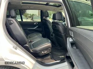 2019 BMW X7 xDrive50i z VIN 5UXCX4C55KLS38210, wystawiony jako Copart lot #59935315 z przebiegiem 126 853 mil mil oraz Czysty tytuł • Clean title. Historia ofert i sprzedaży dostępna na DreamBid. Obrazek 6.