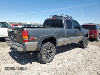 1999 GMC Sierra 1500 SLE z VIN 2GTEK19T8X1512607, wystawiony jako Copart lot #58053205 z przebiegiem 170 792 mil mil oraz Szkoda całkowita • Salvage title. Historia ofert i sprzedaży dostępna na DreamBid. Obrazek 3.