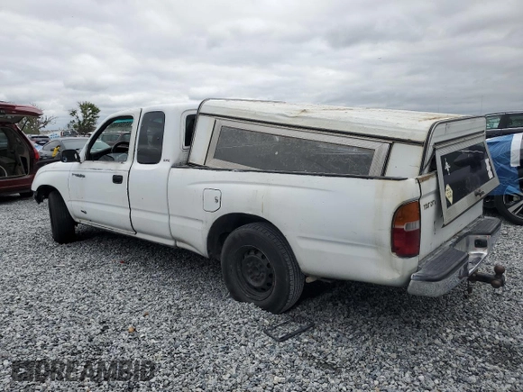 1999 Toyota Tacoma z VIN 4TAVL52N8XZ435689, wystawiony jako Copart lot #52162105 z przebiegiem 2 317 301 mil mil oraz Szkoda całkowita • Salvage title. Historia ofert i sprzedaży dostępna na DreamBid. Obrazek 2.