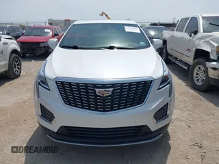 2021 Cadillac XT5 FWD Premium Luxury z VIN 1GYKNCR42MZ174309, wystawiony jako IAAI lot #42051341 z przebiegiem 75 544 mil mil oraz . Historia ofert i sprzedaży dostępna na DreamBid. Obrazek 12.