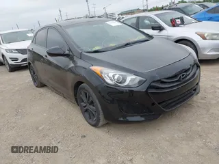 2015 Hyundai Elantra GT with VIN KMHD35LH3FU241149, listed as a IAAI auction lot 42163508 with 124,121 mi miles. Bid and sale history available at carsss.com. Image 1.