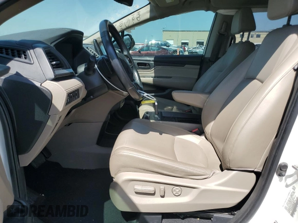 2019 Honda Odyssey Touring with VIN 5FNRL6H86KB089055, listed as a Copart auction lot 56980975 with 154,842 mi miles and Salvage title. Bid and sale history available at DreamBid. Image 7.