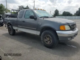 2004 Ford F-150 XL with VIN 2FTRX18W04CA42944, listed as a Copart auction lot 66496505 with 238,990 mi miles and Clean title. Bid and sale history available at DreamBid. Image 4.
