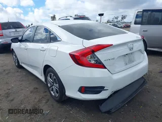 2018 Honda Civic LX with VIN 2HGFC2F5XJH603214, listed as a IAAI auction lot 41788384 with 114,876 mi miles and . Bid and sale history available at carsss.com. Image 3.