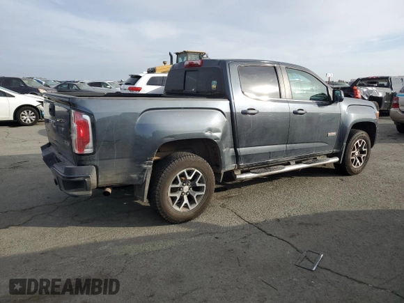 2015 GMC Canyon 4WD SLE with VIN 1GTG6BE31F1221315, listed as a Copart auction lot 78237394 with 93,411 mi miles and Salvage Title. Bid and sale history available at carsss.com. Image 3.