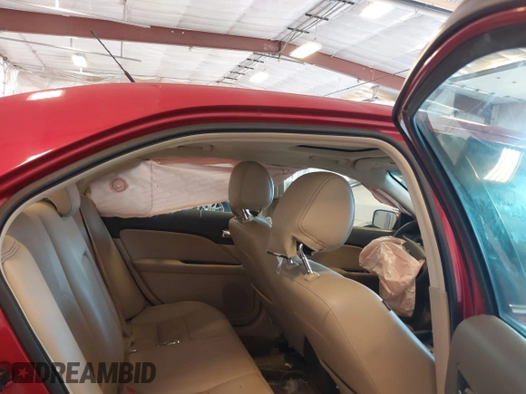 2012 Ford Fusion SEL with VIN 3FAHP0JAXCR338537, listed as a IAAI auction lot 41840670 with 106,690 mi miles. Bid and sale history available at carsss.com. Image 8.
