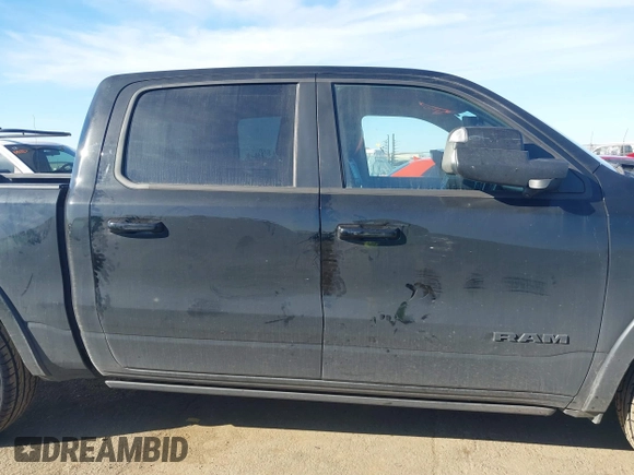 2023 Ram 1500 Limited with VIN 1C6SRFHT5PN542859, listed as a IAAI auction lot 41669646 with 80,045 mi miles and . Bid and sale history available at DreamBid. Image 13.