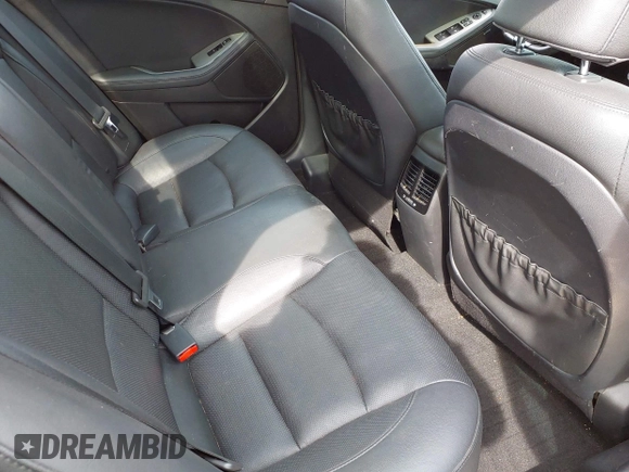 2014 Kia Optima SXL Turbo with VIN 5XXGR4A66EG307497, listed as a IAAI auction lot 42020082 with 134,736 mi miles and . Bid and sale history available at DreamBid. Image 8.
