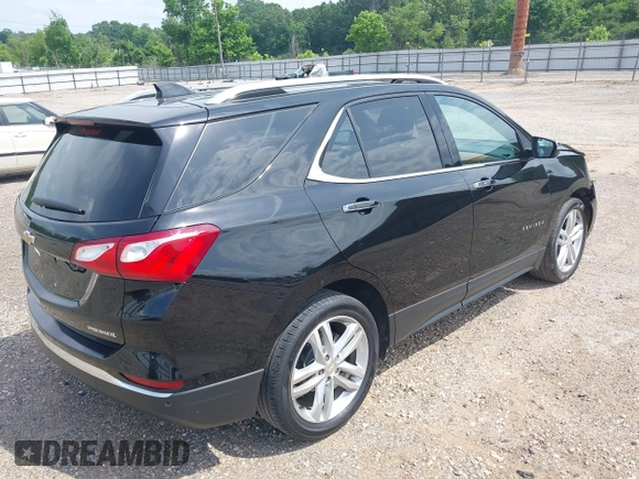 2021 Chevrolet Equinox Premier with VIN 2GNAXNEV5M6151910, listed as a IAAI auction lot 42110010 with 45,911 mi miles and . Bid and sale history available at DreamBid. Image 4.