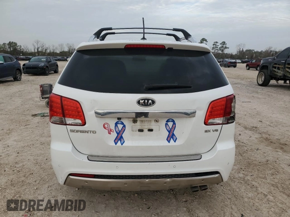 2012 Kia Sorento SX with VIN 5XYKW4A21CG303835, listed as a Copart auction lot 48239835 with 335,934 mi miles and Salvage Title. Bid and sale history available at carsss.com. Image 6.