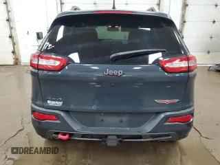 2016 Jeep Cherokee Trailhawk z VIN 1C4PJMBS5GW179273, wystawiony jako Copart lot #61175695 z przebiegiem 110 295 mil mil oraz Czysty tytuł • Clean title. Historia ofert i sprzedaży dostępna na DreamBid. Obrazek 6.