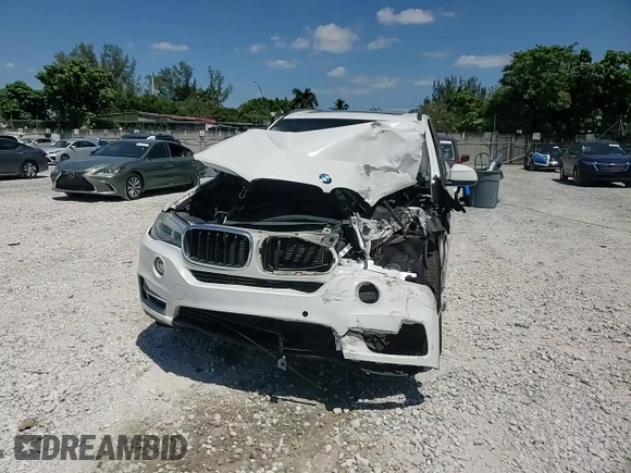 2014 BMW X5 xDrive35i with VIN 5UXKR0C52E0H20513, listed as a Copart auction lot 52831615 with 111,414 mi miles and Salvage Title. Bid and sale history available at carsss.com. Image 12.