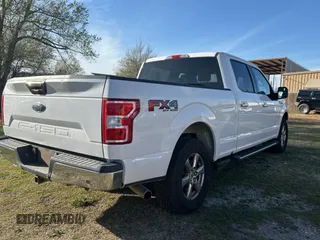 2018 Ford F-150 XL with VIN 1FTFW1E5XJKE02519, listed as a Copart auction lot 50268565 with 184,094 mi miles and Clean title. Bid and sale history available at DreamBid. Image 4.