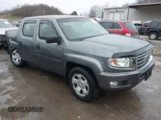 2012 Honda Ridgeline RT with VIN 5FPYK1F24CB456298, listed as a IAAI auction lot 40869948 with 123,329 mi miles and . Bid and sale history available at DreamBid. Image 1.