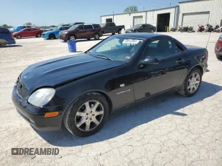1999 Mercedes-Benz SLK-Class with VIN WDBKK47F5XF129037, listed as a Copart auction lot 68842504 with 74,397 mi miles and Salvage Title. Bid and sale history available at carsss.com. Image 1.