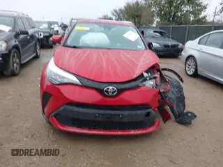 2020 Toyota C-HR LE with VIN JTNKHMBX4L1067648, listed as a IAAI auction lot 41556302 with 64,698 mi miles. Bid and sale history available at carsss.com. Image 11.