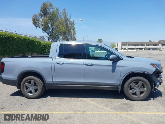 2022 Honda Ridgeline RTL-E z VIN 5FPYK3F78NB028776, wystawiony jako IAAI lot #42077805 z przebiegiem 22 971 mil mil oraz . Historia ofert i sprzedaży dostępna na DreamBid. Obrazek 14.