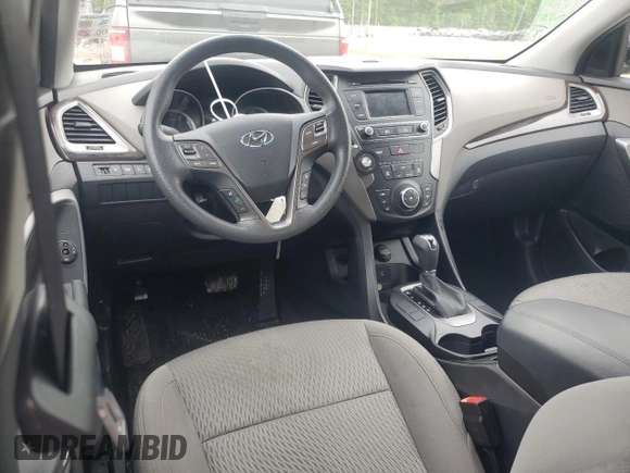 2017 Hyundai Santa Fe 2.4L z VIN 5NMZT3LBXHH038022, wystawiony jako Copart lot #51060545 z przebiegiem 63 790 mil mil oraz Szkoda całkowita • Salvage title. Historia ofert i sprzedaży dostępna na DreamBid. Obrazek 8.