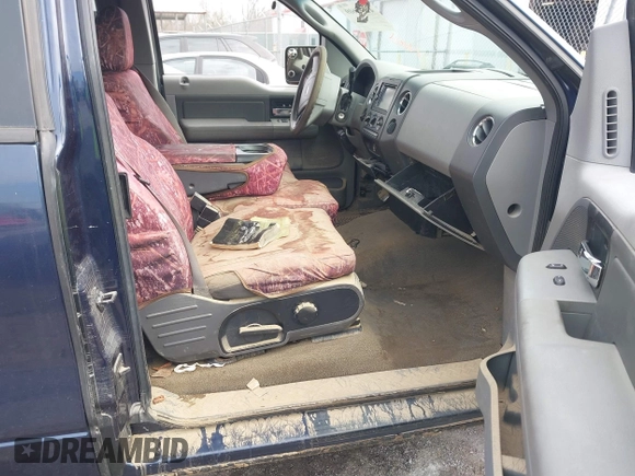 2005 Ford F-150 XLT with VIN 1FTPX12565NA61341, listed as a IAAI auction lot 41693609 with 401,988 mi miles. Bid and sale history available at carsss.com. Image 5.