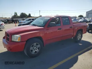 2006 Dodge Dakota SLT with VIN 1D7HW48K86S633119, listed as a Copart auction lot 63246465 with 223,530 mi miles and Salvage title. Bid and sale history available at DreamBid. Image 1.