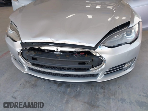 2013 Tesla Model S Performance with VIN 5YJSA1DP6DFP07999, listed as a IAAI auction lot 42284612 with 123,261 mi miles and . Bid and sale history available at DreamBid. Image 6.