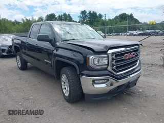 2017 GMC Sierra 1500 SLE with VIN 1GTV2MEC1HZ345586, listed as a IAAI auction lot 42572105 with 85,036 mi miles and . Bid and sale history available at DreamBid. Image 1.