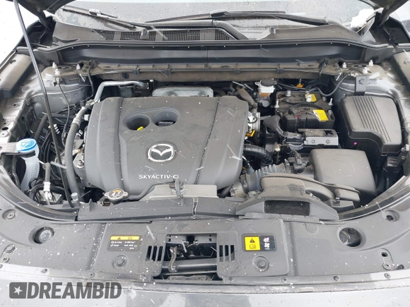 2021 Mazda CX-5 Touring with VIN JM3KFBCM8M0311433, listed as a IAAI auction lot 40554094 with 23,319 mi miles. Bid and sale history available at carsss.com. Image 10.