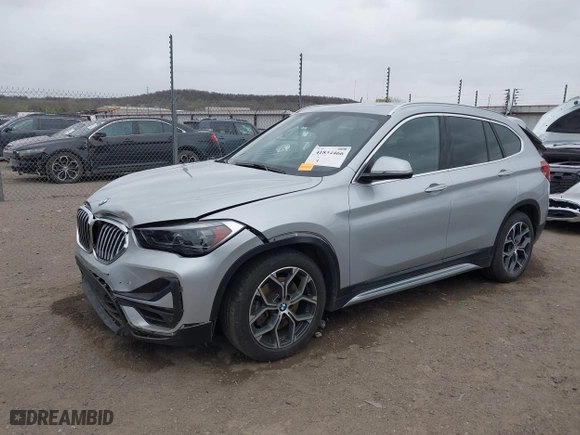 2020 BMW X1 xDrive28i with VIN WBXJG9C00L5S00032, listed as a IAAI auction lot 41834466 with 70,763 mi miles. Bid and sale history available at carsss.com. Image 18.