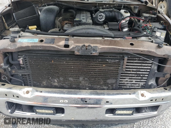 2001 Dodge 2500 z VIN 3B7KF23611G707673, wystawiony jako Copart lot #54608365 z przebiegiem 286 072 mil mil oraz Szkoda całkowita • Salvage title. Historia ofert i sprzedaży dostępna na DreamBid. Obrazek 11.