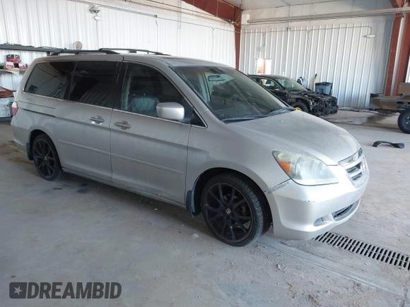 2006 Honda Odyssey EX-L z VIN 5FNRL387X6B413006, wystawiony jako IAAI lot #41687289 z przebiegiem 192 701 mil mil oraz . Historia ofert i sprzedaży dostępna na DreamBid. Obrazek 1.