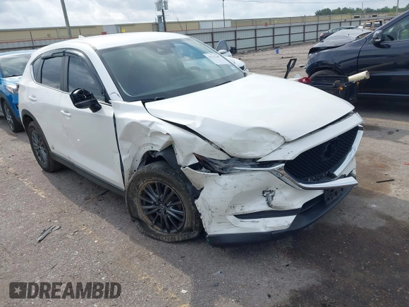 2020 Mazda CX-5 Touring z VIN JM3KFBCM2L0786784, wystawiony jako IAAI lot #42127457 z przebiegiem 62 665 mil mil oraz . Historia ofert i sprzedaży dostępna na DreamBid. Obrazek 1.