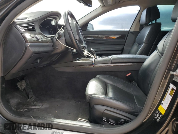 2015 BMW 7 Series 740Li xDrive with VIN WBAYF4C50FGS99289, listed as a Copart auction lot 79809474 with 128,993 mi miles and Salvage Title. Bid and sale history available at carsss.com. Image 7.