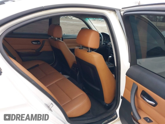2010 BMW 3 Series 328i with VIN WBAPH7G51ANM52218, listed as a IAAI auction lot 41066937 with 129,932 mi miles and . Bid and sale history available at carsss.com. Image 8.