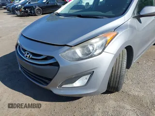 2013 Hyundai Elantra GT with VIN KMHD35LE6DU084154, listed as a IAAI auction lot 42079602 with 194,314 mi miles. Bid and sale history available at carsss.com. Image 6.