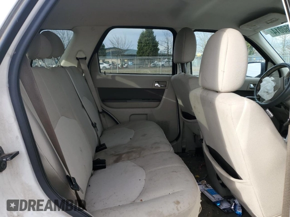2009 Mercury Mariner Hybrid z VIN 4M2CU29309KJ04980, wystawiony jako Copart lot #85360014 z przebiegiem 166 860 mil mil oraz Szkoda całkowita • Salvage title. Historia ofert i sprzedaży dostępna na DreamBid. Obrazek 11.