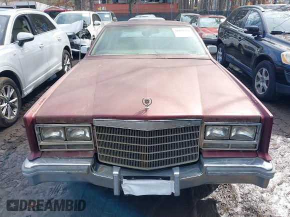1982 Cadillac Eldorado z VIN 1G6AL578XCE604086, wystawiony jako IAAI lot #41676376 z przebiegiem 102 650 mil mil oraz . Historia ofert i sprzedaży dostępna na DreamBid. Obrazek 6.