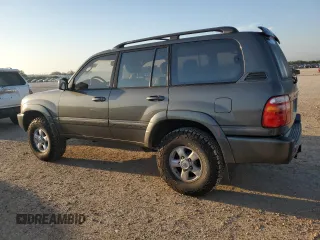2000 Toyota Land Cruiser z VIN JT3HT05J9Y0123937, wystawiony jako Copart lot #56599145 z przebiegiem 132 262 mil mil oraz Szkoda całkowita • Salvage title. Historia ofert i sprzedaży dostępna na DreamBid. Obrazek 2.