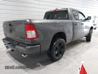 2021 Ram 1500 Big Horn z VIN 1C6SRFBT8MN696504, wystawiony jako IAAI lot #41669093 z przebiegiem 63 356 mil mil oraz . Historia ofert i sprzedaży dostępna na DreamBid. Obrazek 4.