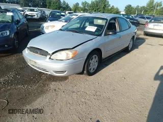 2005 Ford Taurus SE z VIN 1FAFP53U25A216523, wystawiony jako IAAI lot #42648554 z przebiegiem 175 042 mil mil oraz . Historia ofert i sprzedaży dostępna na DreamBid. Obrazek 2.