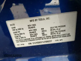 2020 Tesla Model Y Long Range with VIN 5YJYGDEE1LF006227, listed as a IAAI auction lot 42100833 with 49,761 mi miles and . Bid and sale history available at DreamBid. Image 9.