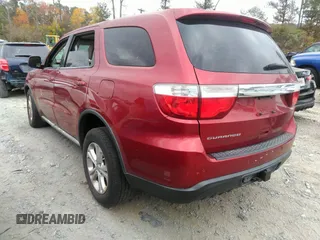2013 Dodge Durango SXT with VIN 1C4RDHAG0DC694859, listed as a IAAI auction lot 40809655 with 190,130 mi miles and . Bid and sale history available at DreamBid. Image 3.