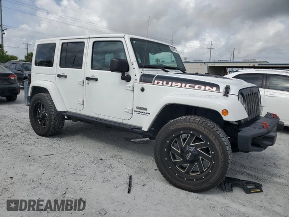 2017 Jeep Wrangler Unlimited Rubicon z VIN 1C4HJWFG6HL692928, wystawiony jako Copart lot #60049775 z przebiegiem 145 033 mil mil oraz Nie do naprawy • Non repairable. Historia ofert i sprzedaży dostępna na DreamBid. Obrazek 4.