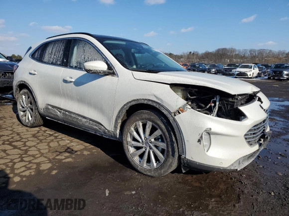 2021 Ford Escape Titanium Hybrid with VIN 1FMCU9DZ0MUA36540, listed as a Copart auction lot 42286485 with 46,908 mi miles and Salvage title. Bid and sale history available at DreamBid. Image 4.