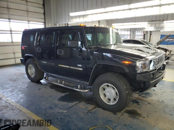 2003 Hummer H2 with VIN 5GRGN23U73H116472, listed as a Copart auction lot 86919214 with 172,543 mi miles and Salvage Title. Bid and sale history available at carsss.com. Image 4.