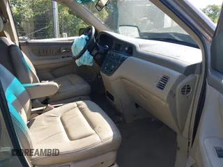 2003 Honda Odyssey EX-L z VIN 5FNRL180X3B055800, wystawiony jako IAAI lot #42053575 z przebiegiem 203 398 mil mil oraz . Historia ofert i sprzedaży dostępna na DreamBid. Obrazek 5.