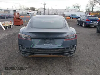 2021 Tesla Model S Long Range with VIN 5YJSA1E51MF440929, listed as a IAAI auction lot 41144902 with Not provided miles and . Bid and sale history available at DreamBid. Image 6.